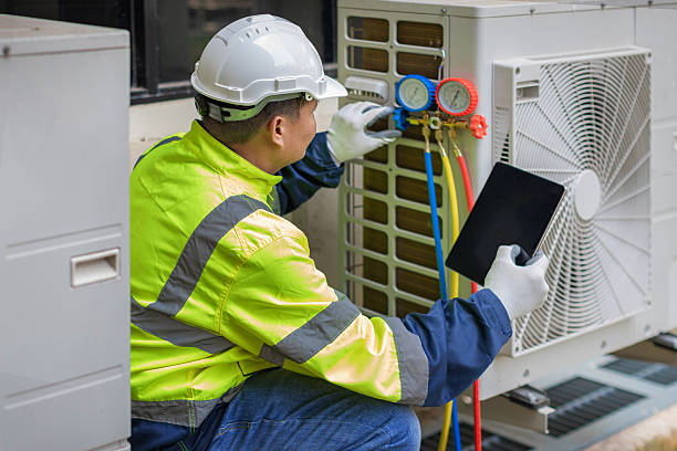 Professional Hvac technician working in Douglas, MA